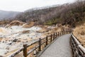 Walk way of Noboribetsu Jigokudani Hell Valley: The volcano valley got its name from the sulfuric smell. Royalty Free Stock Photo