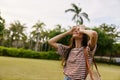 woman beautiful long smiling summer walk park t-shirt freedom hair lifestyle nature Royalty Free Stock Photo