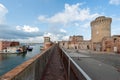 .The walkaway along Fortezza Vecchia (Old Fortress). The watchtower, called Mastio di Matilde, overlooks the sea. Royalty Free Stock Photo