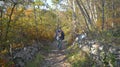 Walker in Autumn Woodland Italy