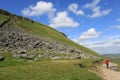 Walker on the footpath to Pen-y-ghent N Yorkshire Royalty Free Stock Photo