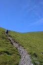 Walker hillside footpath Blencathra, Cumbria, UK