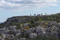 Walkers on a Jurassic karst rock ridge at El Torcal, Antequera, Andalucia. Royalty Free Stock Photo