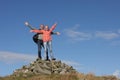 Walkers Standing On Pile Of Rocks Royalty Free Stock Photo