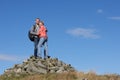 Walkers Standing On Pile Of Rocks Royalty Free Stock Photo