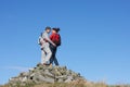 Walkers Standing On Pile Of Rocks Royalty Free Stock Photo