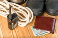 Walkie-talkie, rope, shoes and some money for a dangerous winter Royalty Free Stock Photo