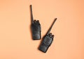 Walkie talkies on beige background, top view Royalty Free Stock Photo