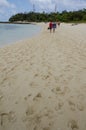 Walking along the beach of Mystery Island in Vanuatu Royalty Free Stock Photo