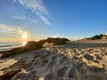 Walking along the sandy beach of Praia Da Gale in Algarve, south of Portugal