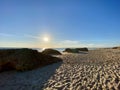 Walking along the sandy beach of Praia Da Gale in Algarve, south of Portugal