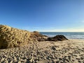 Walking along the sandy beach of Praia Da Gale in Algarve, south of Portugal