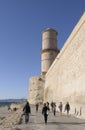 Walking along the coast at Fort Saint-Jean, Marseille, Bouches-du-Rhone, Provence-Alpes-Cote d`Azur Royalty Free Stock Photo