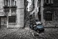 Walking along the old streets of the Croatian city of Rovinj by car. Croatia. Black and white