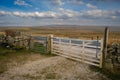 Walking along the Pennine Bridleway between Newby Head Gate to Great Knoutberry Hill near to Ribblehead in the Yorkshire Dales Royalty Free Stock Photo