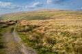 Walking along the Pennine Bridleway between Newby Head Gate to Great Knoutberry Hill near to Ribblehead in the Yorkshire Dales Royalty Free Stock Photo