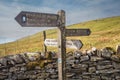 Walking along the Pennine Bridleway between Newby Head Gate to Great Knoutberry Hill near to Ribblehead in the Yorkshire Dales Royalty Free Stock Photo