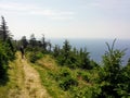 Walking along the skyline trail on Cape Breton Island, Nova Scotia, with the vast Atlantic Ocean behind Royalty Free Stock Photo