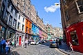 Walking along in the street with colorful building two sides