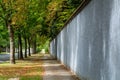 Walking along the walls of champagne house in old French city Reims in August, France