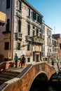 Walking around the old town with small canal in Venice late morning before autumn season in Venice , Italy Royalty Free Stock Photo