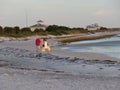 A family walking on the beach