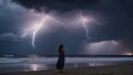 beach, enjoying the sunset. She didn\'t notice the storm clouds gathering about with lightning Royalty Free Stock Photo