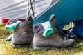Walking boots beside a tent Royalty Free Stock Photo