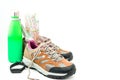 Walking boots and world map and water bottle on white background Royalty Free Stock Photo