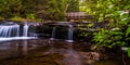Walking bridge and cascades on Kitchen Creek in Ricketts Glen State Park