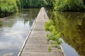 Walking bridge in a pond