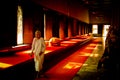 A walking Buddhist nun in a temple in Bangkok, Thailand