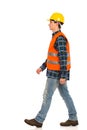 Walking construction worker. Royalty Free Stock Photo