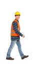 Walking construction worker. Royalty Free Stock Photo