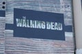 The walking dead tv series logo brand and text sign front of boutique