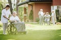 Disabled man in the nursing home garden Royalty Free Stock Photo