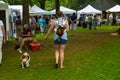 Walking Dog at Lititz Outdoor Fine Art Show Royalty Free Stock Photo