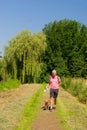 Walking with dog in nature Royalty Free Stock Photo