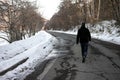 Walking down an empty Winter road