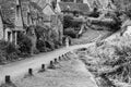 Walking down the path along Arlington Row in Bibury, Cotswolds Royalty Free Stock Photo