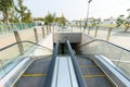 Walking on Escalators Moving way into the underground tunnel Wat Phra Kaew Royalty Free Stock Photo