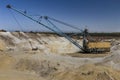 Walking excavator in a clay quarry