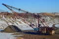 The walking excavator in quarry. Tilt shift picture. Royalty Free Stock Photo