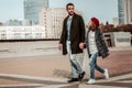 Father walking with his daughter on a weekend