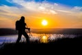 Walking female hiker silhouette and impressive