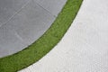 Walking foot path with green grass and tiles background texture Royalty Free Stock Photo