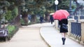 Walking girl under rain Royalty Free Stock Photo