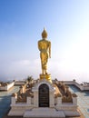Walking golden buddha statue viewpoint in Nan Royalty Free Stock Photo