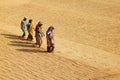 Walking through golden paddy Royalty Free Stock Photo