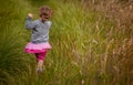 Walking through the high grass Royalty Free Stock Photo